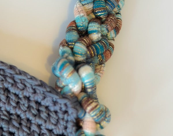 Braided handle handwoven bag
